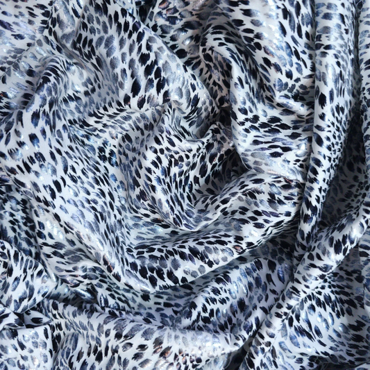 Lycra Lamé / animal print blanco foil 1mt