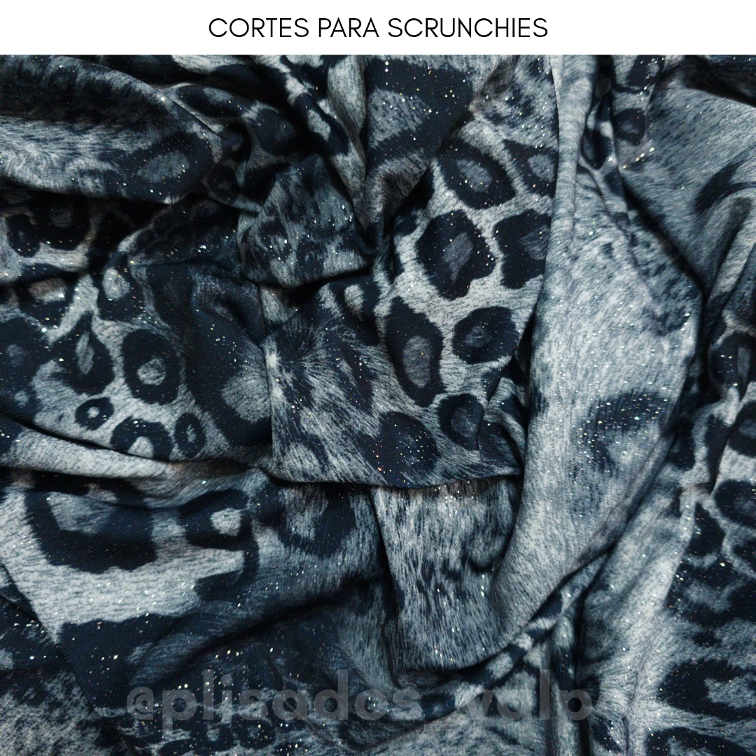 Lycra lamé / animal print brillo plata